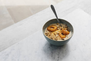 Roasted apricot porridge with almond milk and nuts - FSIF05178