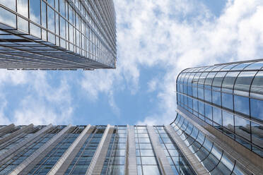 Tall modern office skyscrapers against blue sky, London, UK - WPEF03409