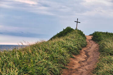 Walkway towards christian cross at Vladivostok, Russia - KNTF05507