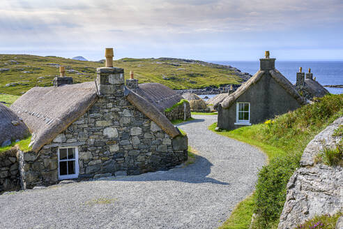 UK, Scotland, Garenin, Old blackhouse village on shore of Isle Of Lewis - ELF02233