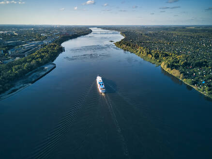 Ship moving on Volga River against sky - KNTF05565