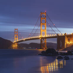 Golden Gate Bridge over sea at night in San Francisco, California, USA - AHF00126