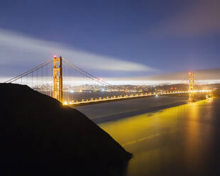 Glowing Golden Gate Bridge at night in San Francisco, California, USA - AHF00139