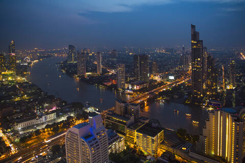 Overview of Bangkok with the Chao Praya river at dusk stock photo
