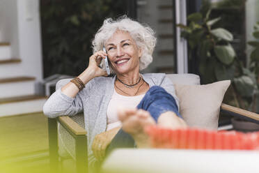 happy smiling middle aged woman at home Stock Photo