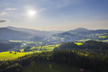 Drone view of sun shining over Lamer Winkel valley in summer - SIEF10062