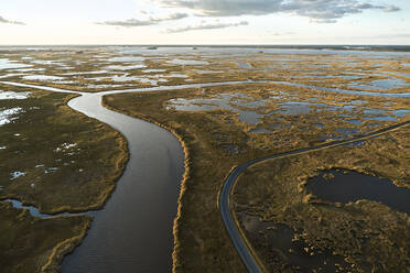 USA, Maryland, Drone view of marshes along Blackwater River at dusk - BCDF00450