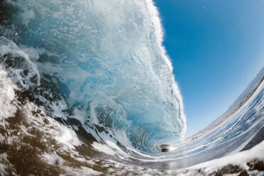 From inside view of powerful blue breaking ocean waves with white foam - ADSF16628