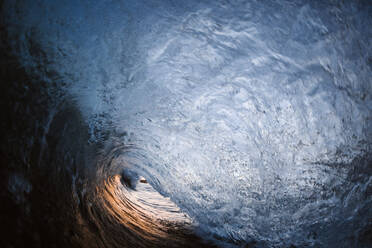 From inside view of powerful blue breaking ocean waves with white foam - ADSF16629