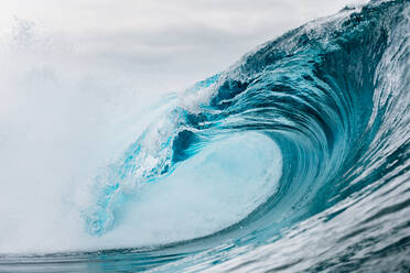 Powerful turquoise breaking ocean waves with white foam - ADSF16633
