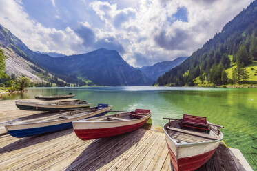 Rowboats left at edge of jetty on shore of Vilsalpsee lake - THAF02935