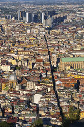 Italy, Campania, Naples, Aerial view of Spaccanapoli Quarter with skyscrapers in background - ABOF00559