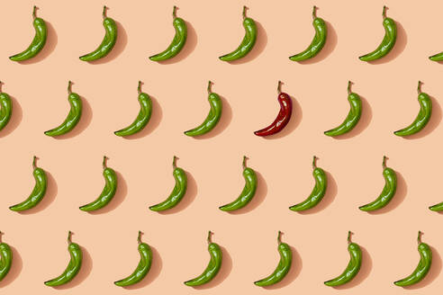 Pattern of green chili peppers with single red one - GEMF04256