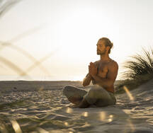 Men Meditate Yoga Glamping Good Health Stock Photo by ©sinenkiy