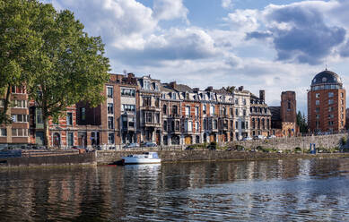 Belgium, Liege Province, Liege, City canal stretching in front of row of townhouses - HAMF00755