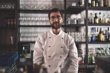 Portrait of confident male chef in commercial kitchen - MASF20143