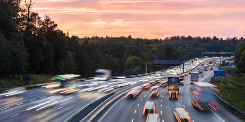 Germany, Baden-Wurttemberg, Stuttgart, Traffic on Bundesautobahn 8 at dusk - WDF06338