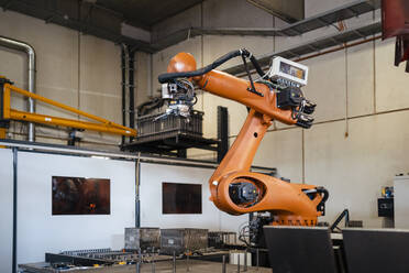 Industrial robots welding in factory - DIGF12927