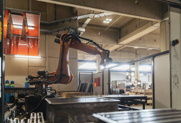 Automated robotic arms in manufacturing factory - DIGF12940