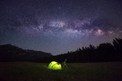 Camping tent at night against amazing sky full of stars and milky-way - CAVF89783
