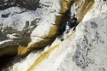 Canyoneering Sorrosal Canyon in the Pyrenees, Broto village, Huesca Province in Spain. - CAVF89874