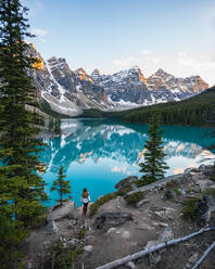 Walking Into Perfect Sunset at Moraine Lake at Lake Louise Banff - CAVF89886