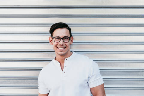 Smiling man in eyeglasses against shutter stock photo