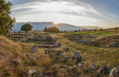 Albania, Gjirokaster County, Ruins of ancient Greek city of Antigonia at sunset - MAMF01360