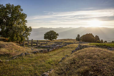 Albania, Gjirokaster County, Ruins of ancient Greek city of Antigonia at sunset - MAMF01361