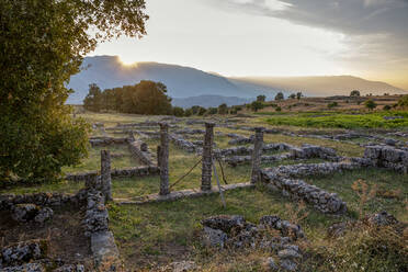 Albania, Gjirokaster County, Ruins of ancient Greek city of Antigonia at sunset - MAMF01365