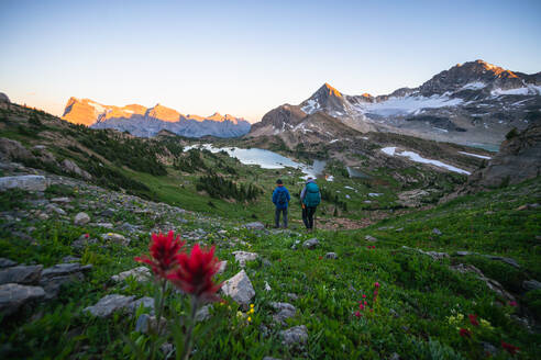 Couple Hiking Together During Sunset in Height of the Rockies - CAVF90106