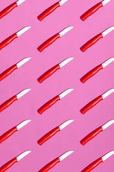 Large group of table knives on pink background - GEMF04289