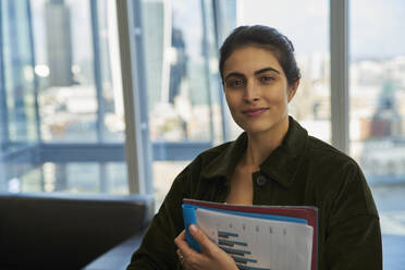 Portrait confident businesswoman in office - CAIF29950
