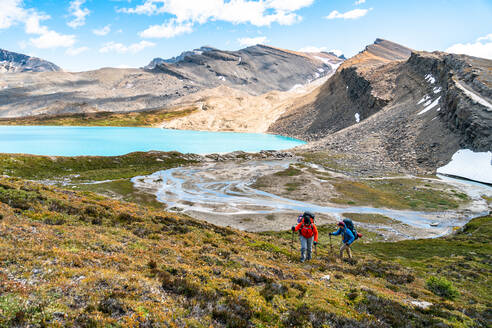 Backpackers Trekking into the Alpine Above Michelle Lakes - CAVF90206