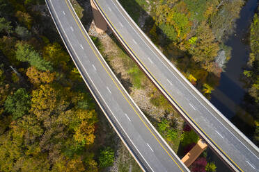 USA, West Virginia, Aerial view of U.S. Route 48 bridge stretching over Lost River in Appalachian Mountains - BCDF00466