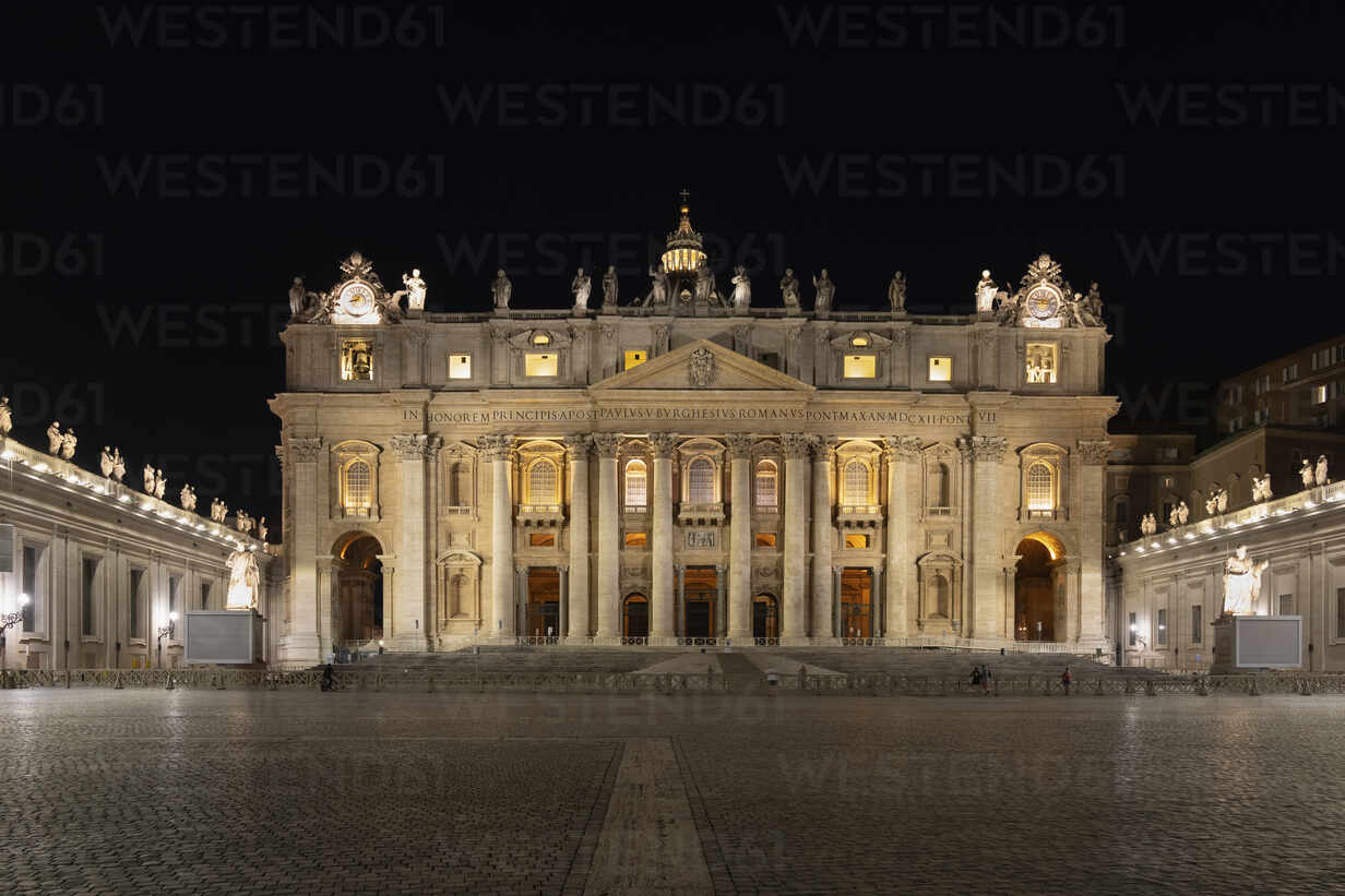 Illuminated St. Peter's Basilica and St. Peter's Square at night