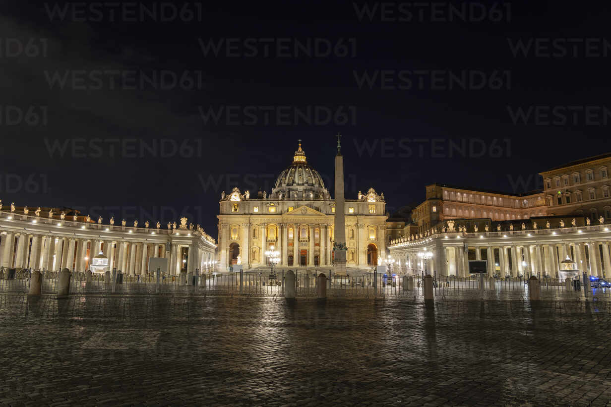 Illuminated St. Peter's Square with obelisk and St. Peter's