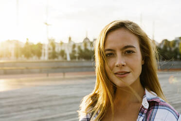 Attractive woman on street during sunny day - XLGF00723