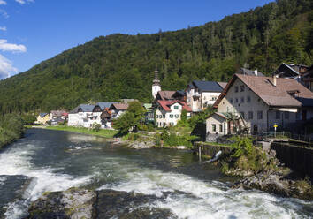 Traun river flowing by building in lauffen at Salzkammergut, Upper Austria, Austria - WWF05606