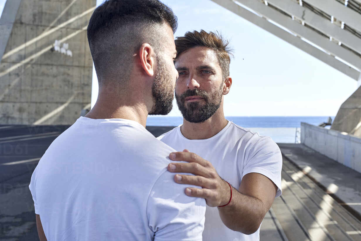 Gay man with boyfriend at Parc del Forum, Barcelona, Spain stock photo