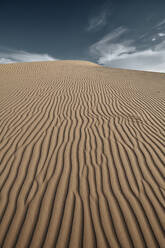 Natural wave pattern on sand of Cadiz Dunes at Mojave Desert, Southern California, USA - BCDF00487