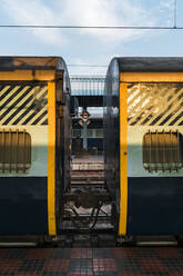 Railroad cars of old train waiting at railroad station - JMPF00507