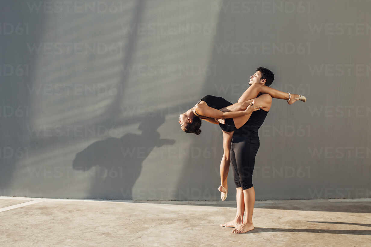 Premium Photo | Painting of a couple dancing in a dance pose generative ai