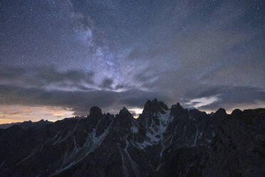 Milky Way and stars over the sharp pinnacles of Cadini di Misurina, Dolomites, Belluno province, Veneto, Italy, Europe - RHPLF17951