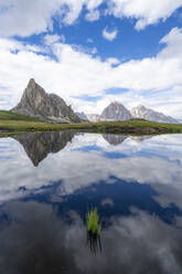 Ra Gusela and Tofane mountains mirrored in water, Giau Pass, Dolomites, Belluno province, Veneto, Italy, Europe - RHPLF17956