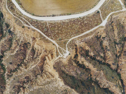Aerial view of brown cliff in Barrancas de Burujon nature reserve - RSGF00437