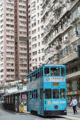 Trams at tram stop, Sai Ying Pun, Hong Kong Island, Hong Kong, China, Asia - RHPLF18233