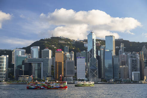 Star Ferry and skyline of Hong Kong Island, Hong Kong, China, Asia - RHPLF18243