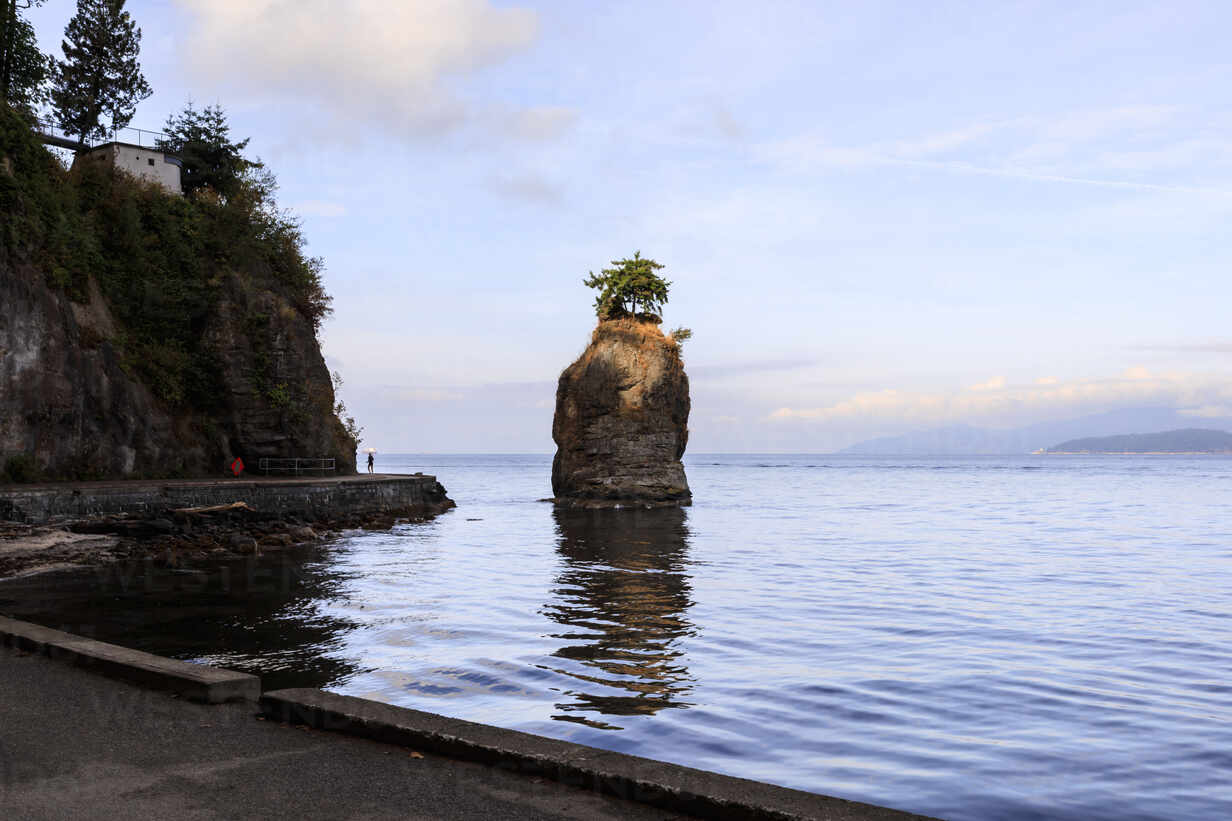 Siwash Rock and Stanley Park Seawall, Vancouver City, British Columbia,  Canada, North America stock photo