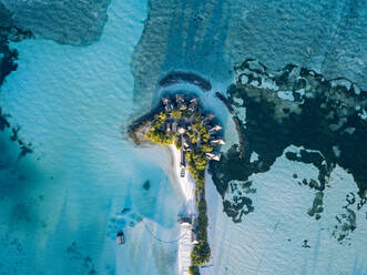 Holiday resort on tropical island, aerial view - KNTF05845